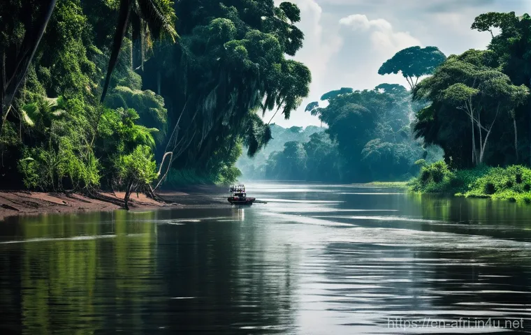 중앙아프리카 공화국 콩고강 투어 - **The Majestic Congo River's Embrace**
A wide, serpentine river, the Congo, stretches out, its s...